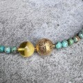 Naszyjnik z bursztynem turkusem i srebrem pozłacanym 4409